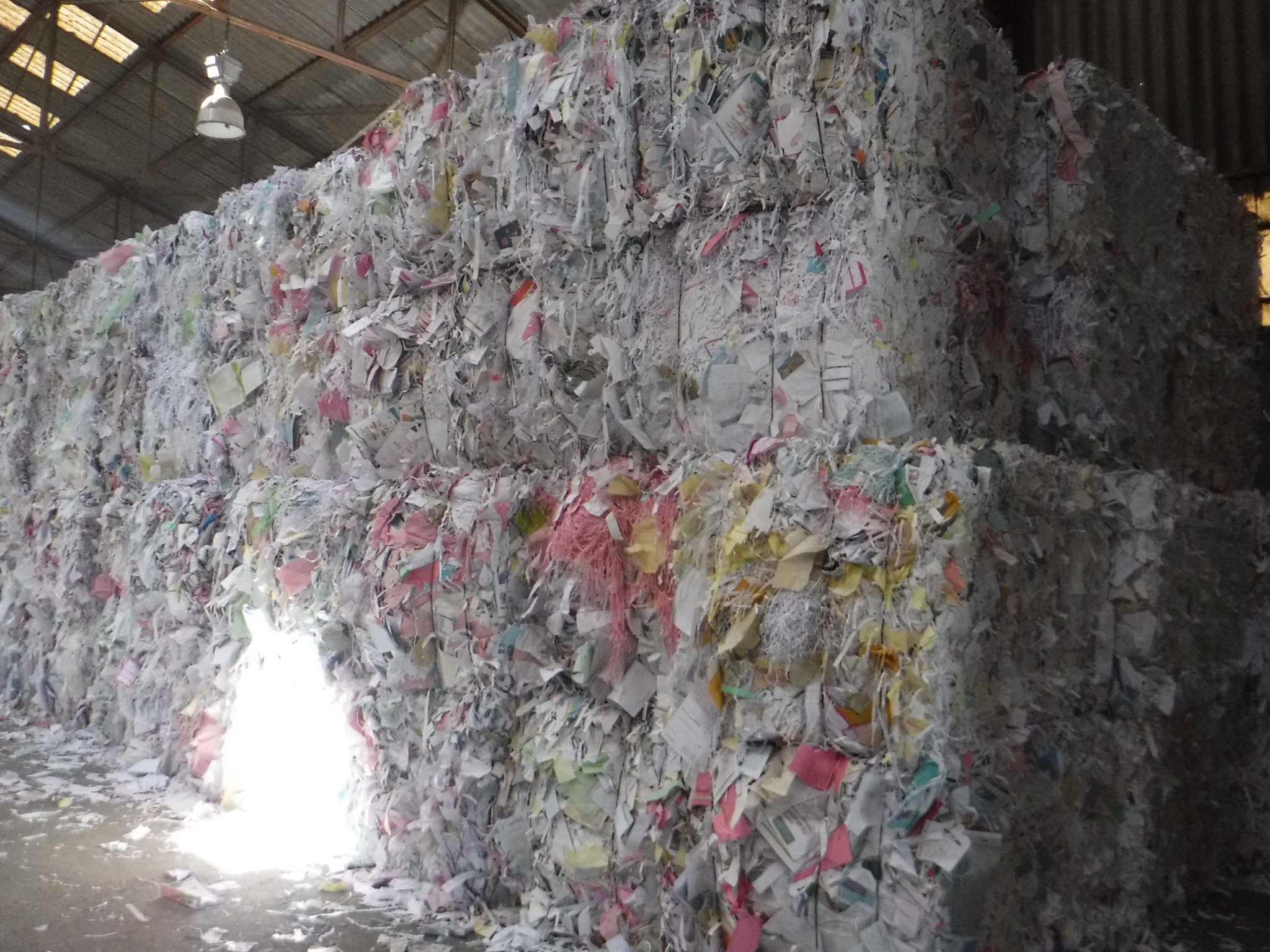 Stacked bales of CHL coloured heavy letter paper